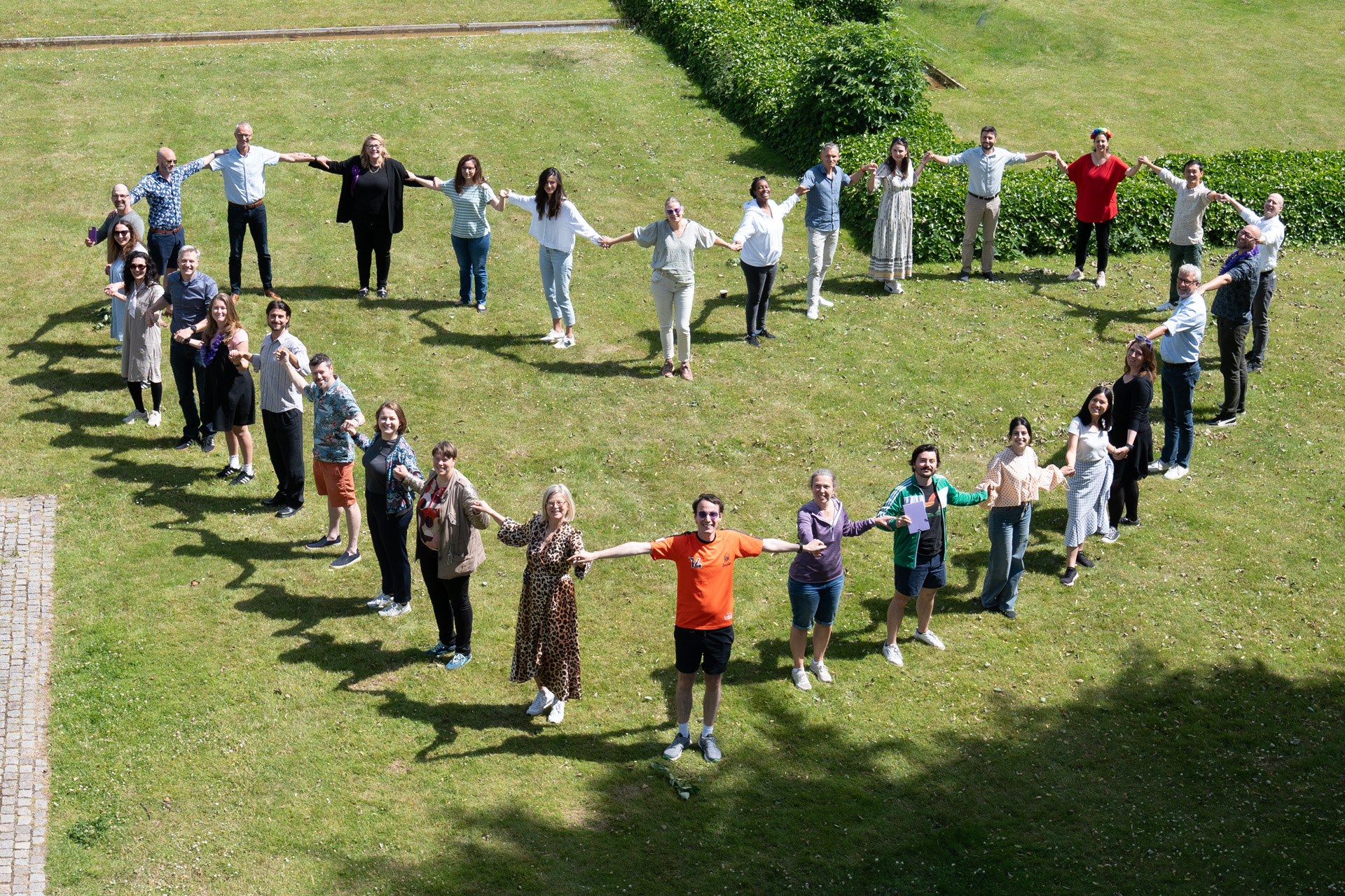 Team forming a heart shape